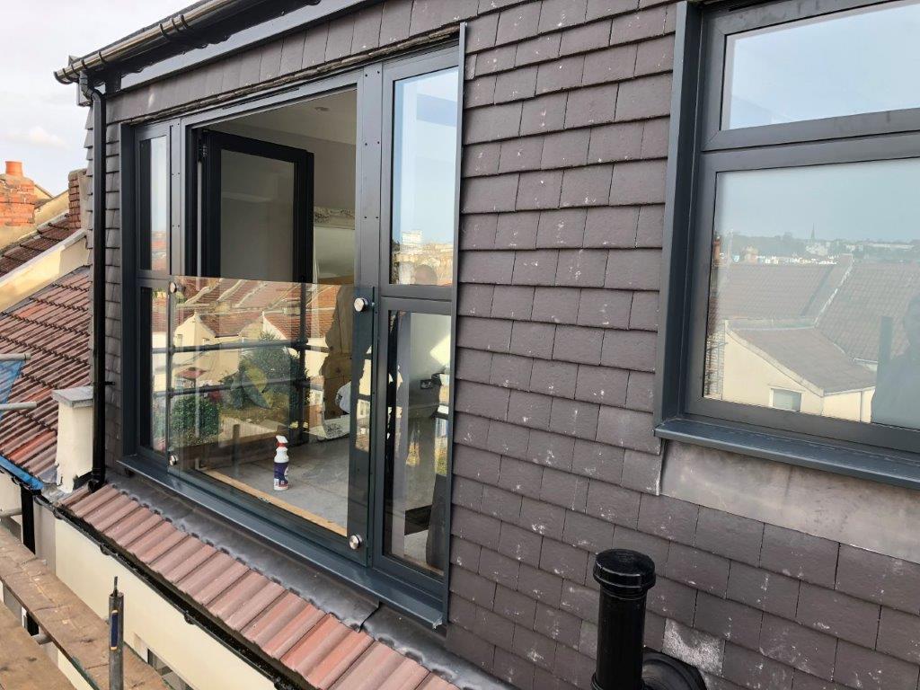 Loft Conversions Loft conversion with a balcony in Bristol